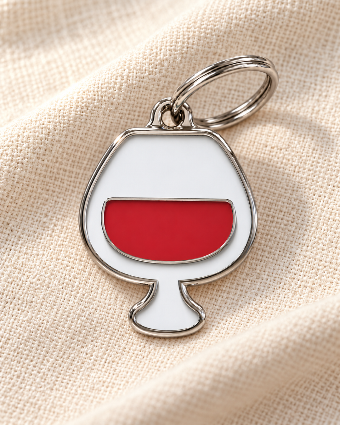 TAGiDOG Red Wine ID Tag dog ID tag on light linen