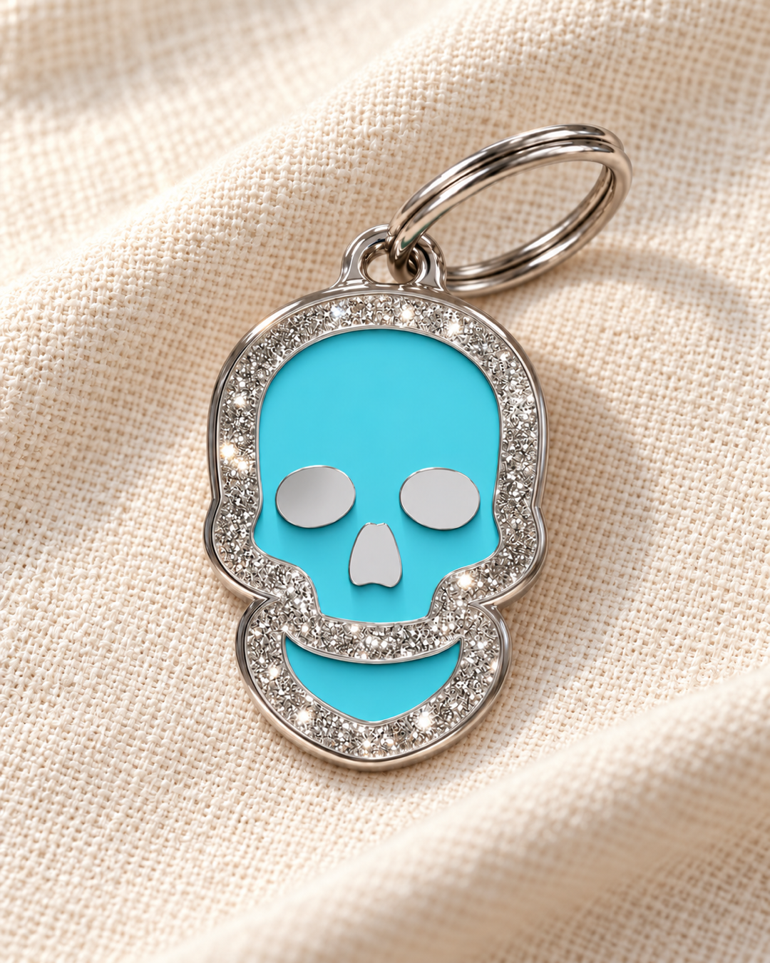 TAGiDOG Skull Spark Blue ID Tag on light linen