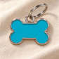 TAGiDOG Solid Bone Blue ID Tag Small dog ID tag on light linen