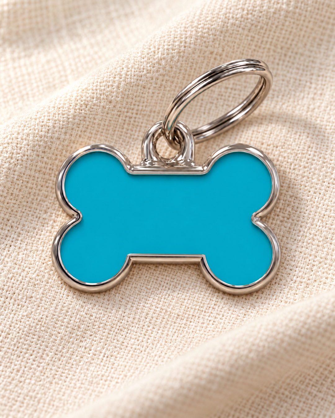 TAGiDOG Solid Bone Blue ID Tag Small dog ID tag on light linen