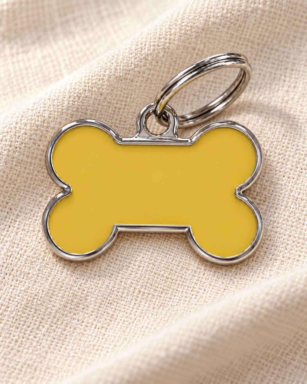 TAGiDOG Solid Bone Yellow ID Tag Medium dog ID tag on light linen