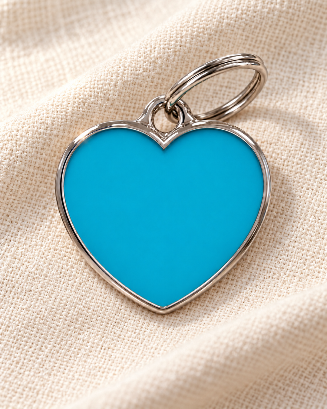 TAGiDOG Solid Heart Blue ID Tag dog ID tag on light linen
