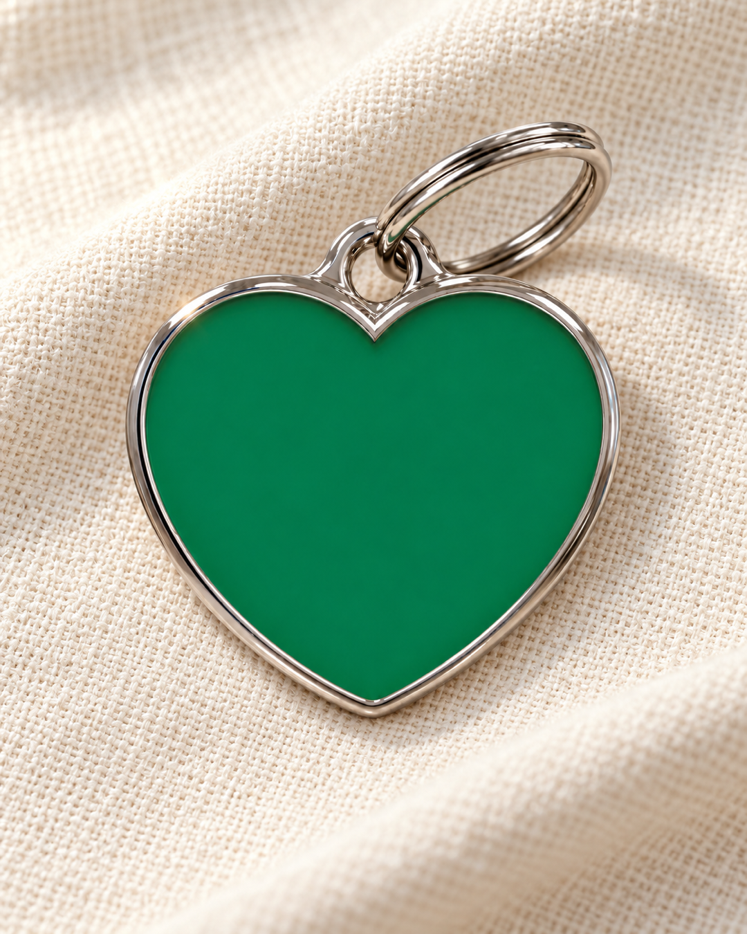 TAGiDOG Solid Heart Green ID Tag dog ID tag on light linen