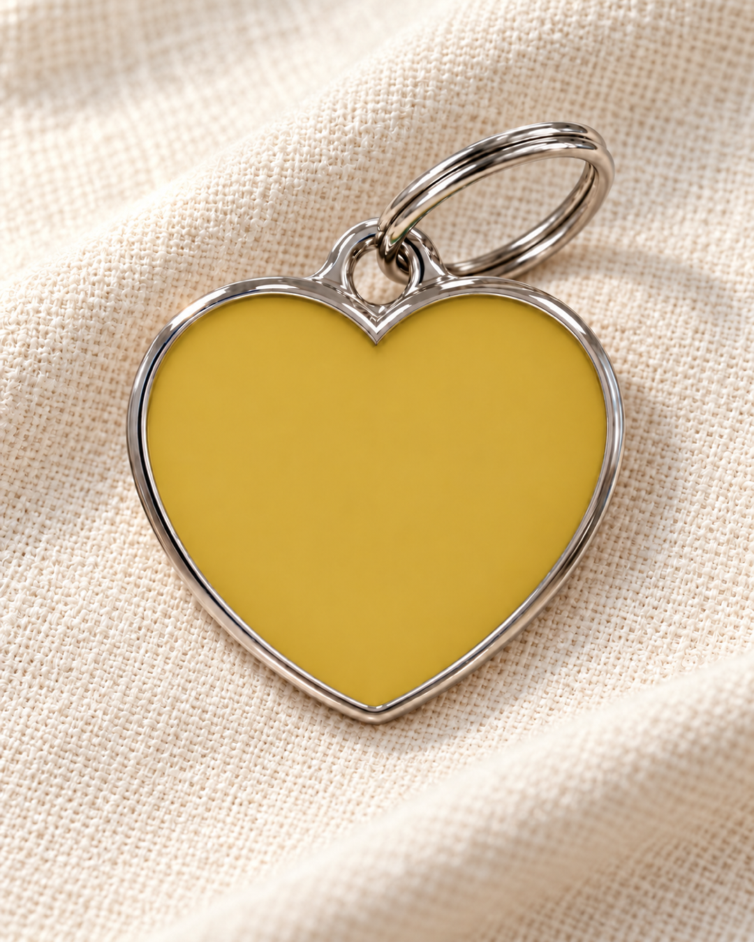 TAGiDOG Solid Heart Yellow ID Tag dog ID tag on light linen