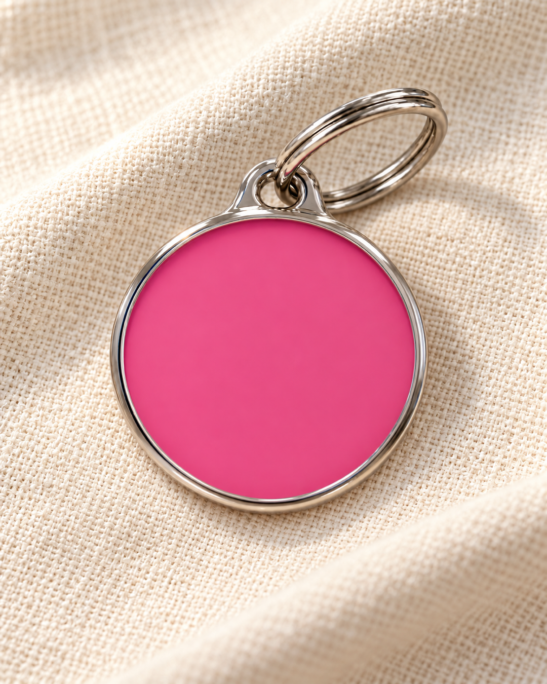 TAGiDOG Solid Round Pink ID Tag dog ID tag on light linen
