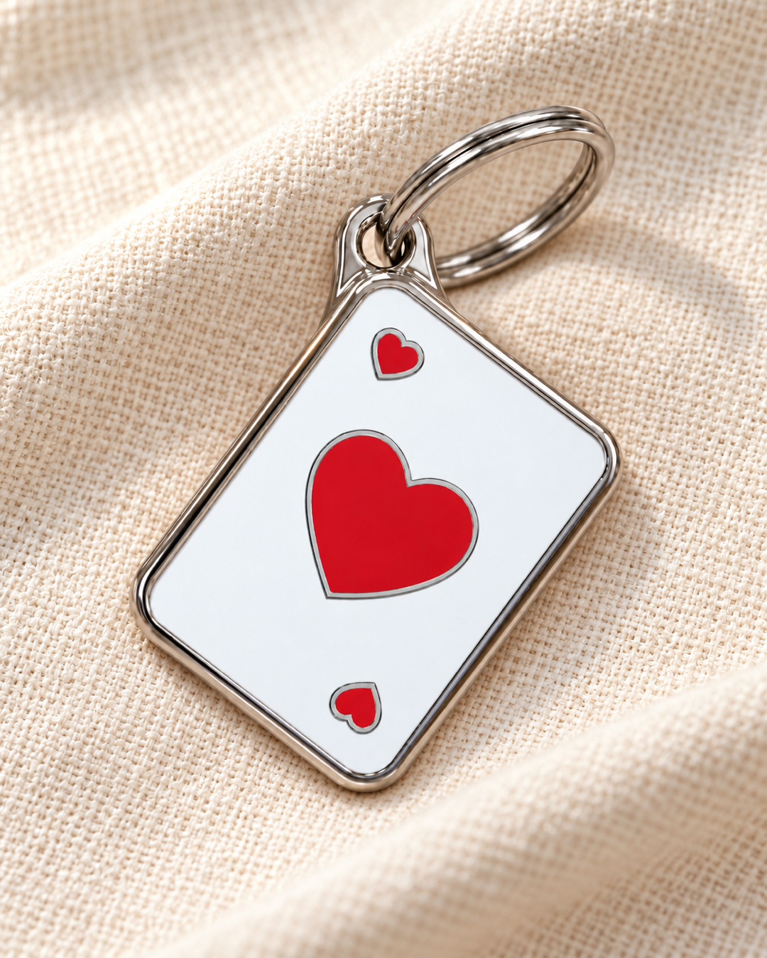 TAGiDOG Vegas Hearts ID Tag dog ID tag on light linen