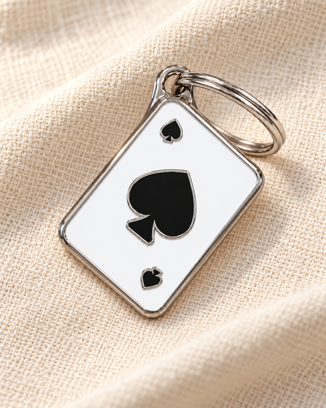 TAGiDOG Vegas Spades ID Tag dog ID tag on light linen